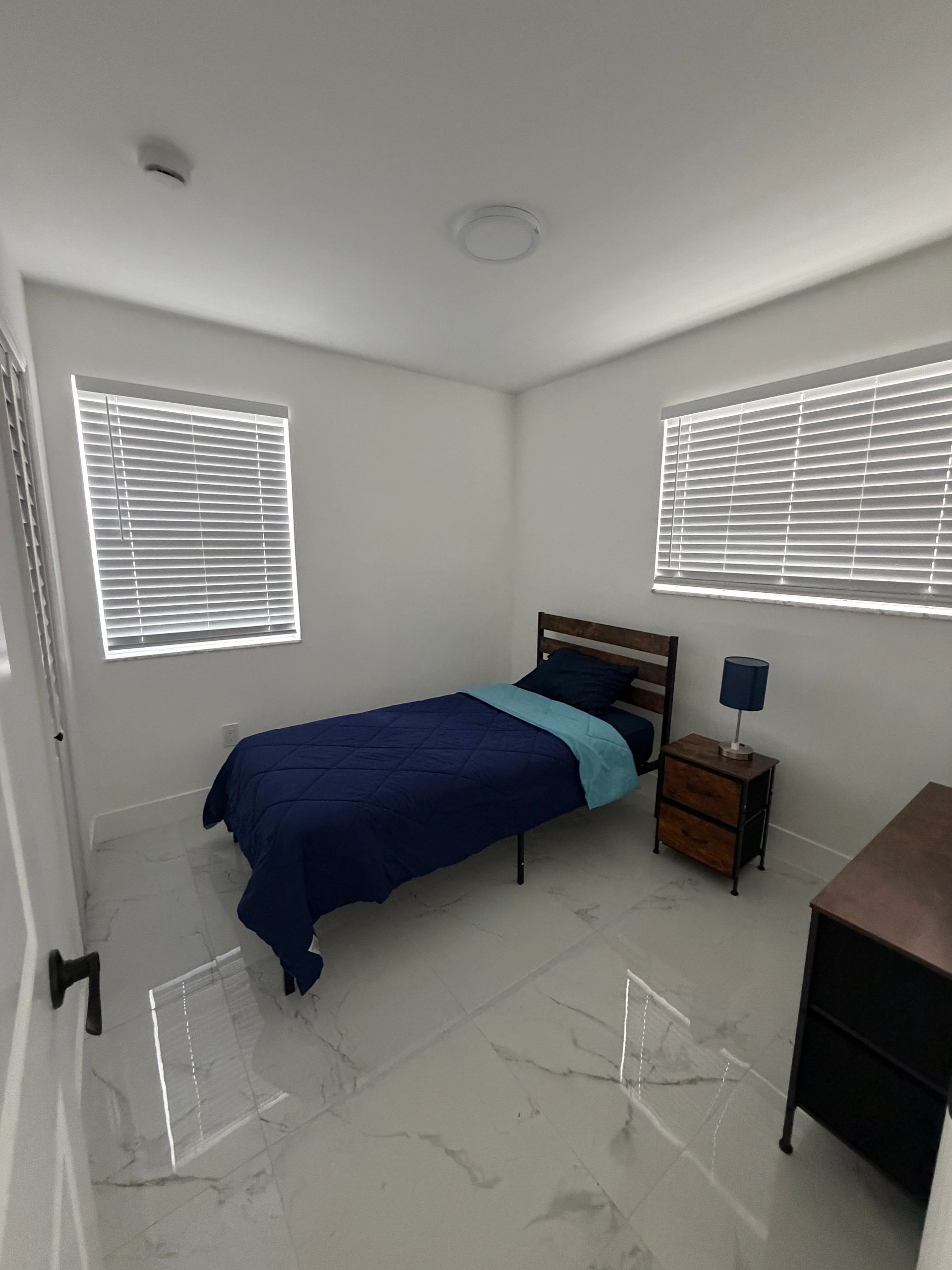 Single bedroom shown at the Miami Central and Flagami residence