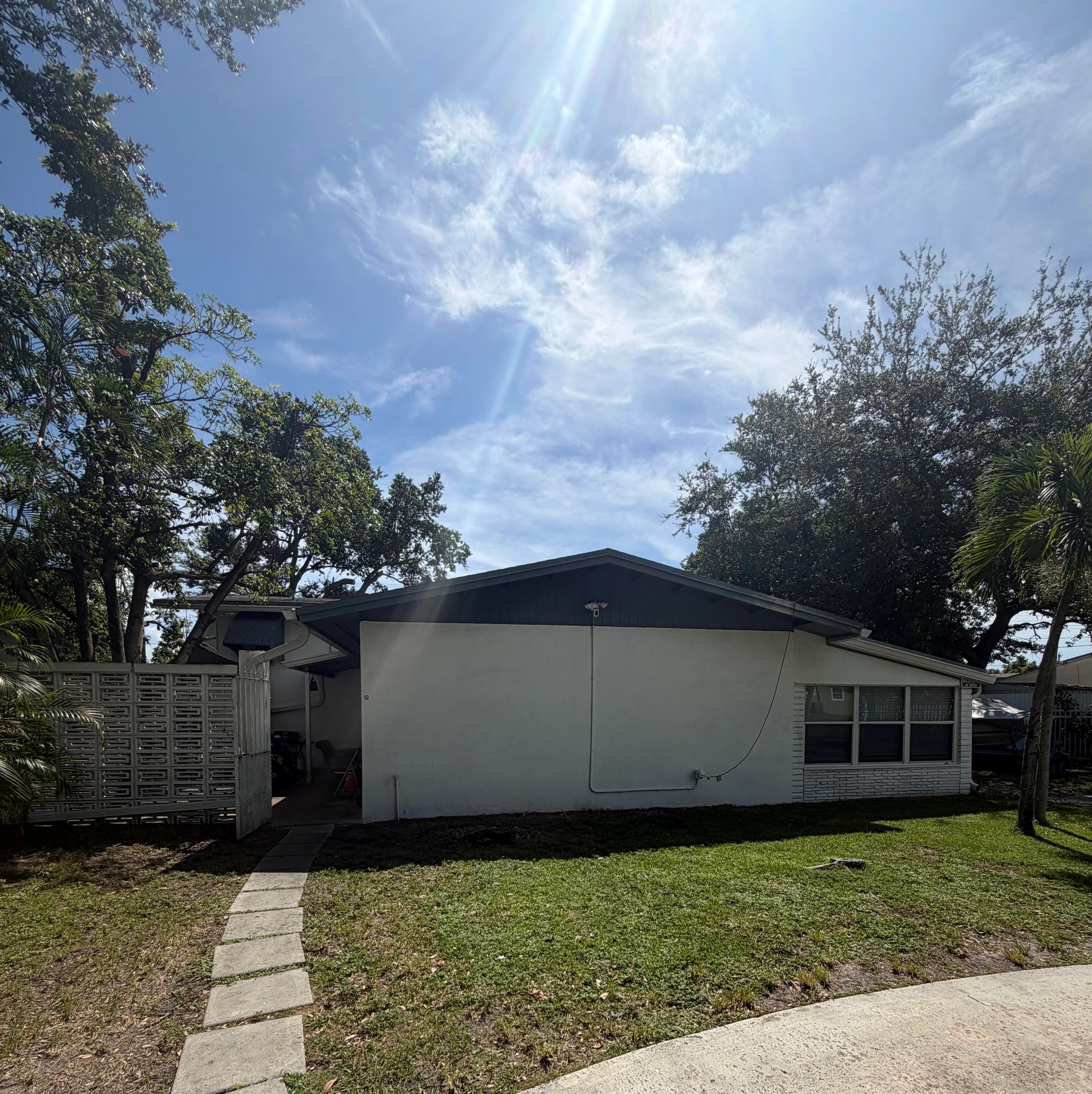 Exterior and lawn of the Miami North residence
